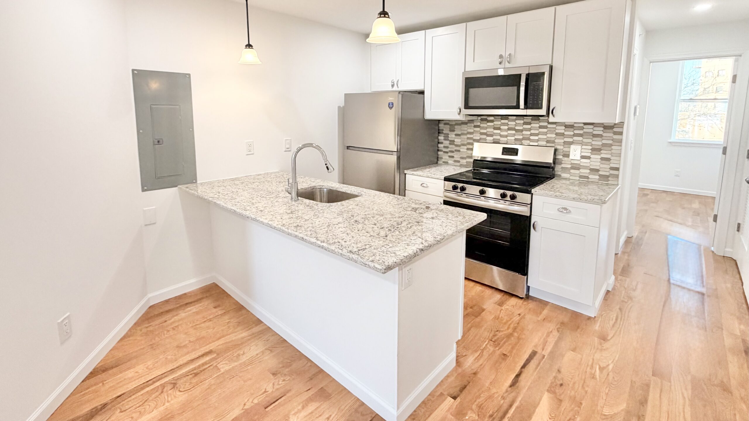 Modern kitchen at 5354 Cedar Ave multifamily
