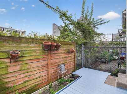 “Private backyard with composite deck in Fishtown Philadelphia home”